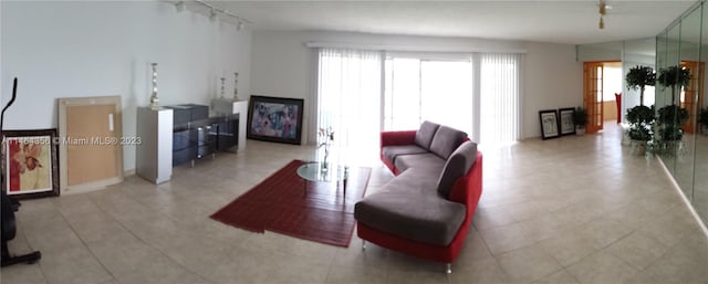 tiled living room with track lighting