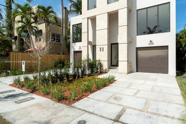 view of front of home with a garage