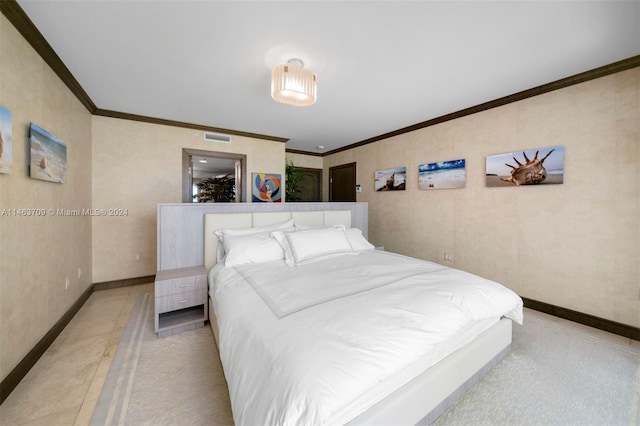 bedroom featuring crown molding