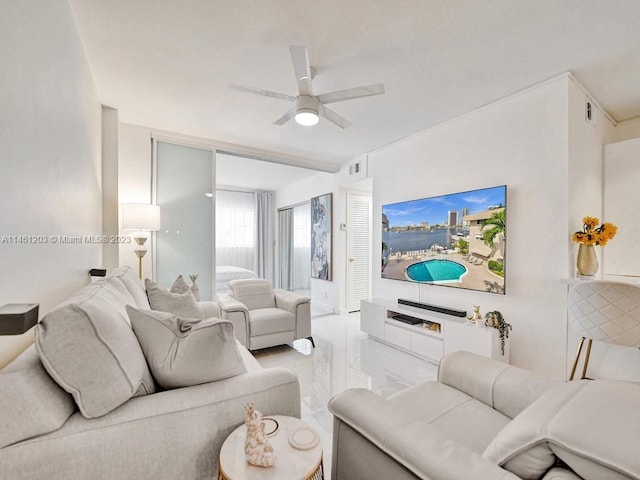 living room with ceiling fan