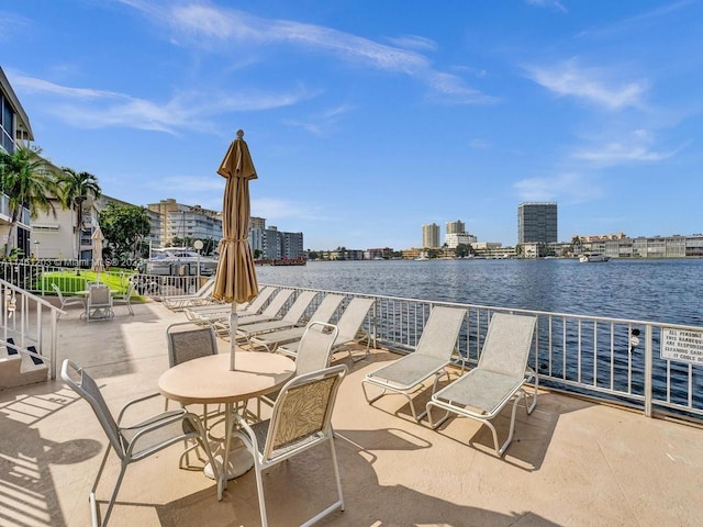 view of patio / terrace with a water view