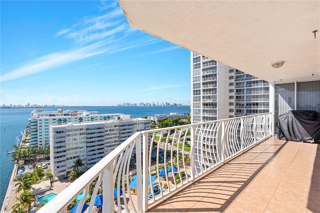 balcony featuring a water view