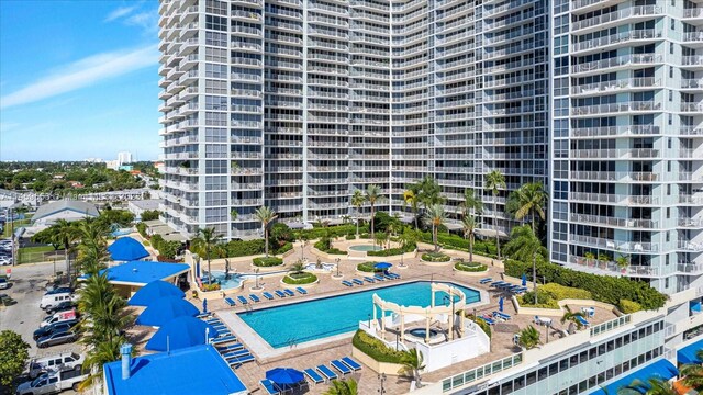 view of property with a community pool