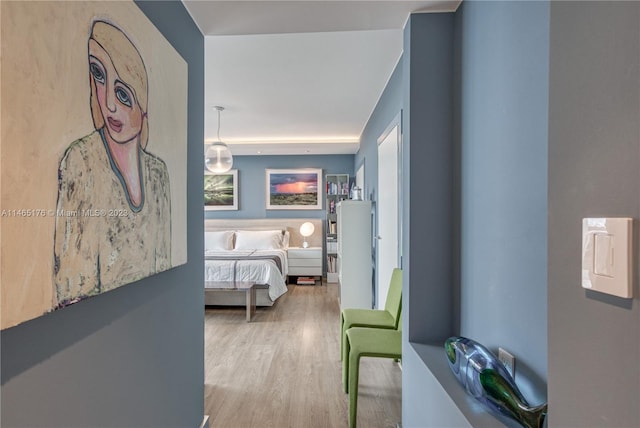 bedroom featuring light wood-type flooring