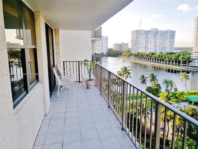 balcony featuring a water view