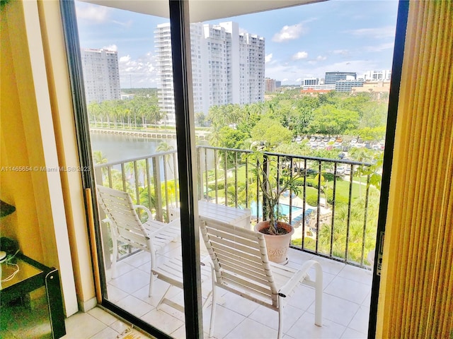 balcony featuring a water view