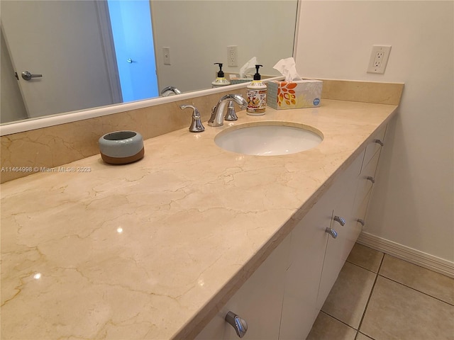 bathroom with oversized vanity and tile flooring