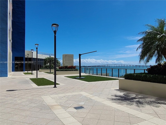 view of home's community with a water view