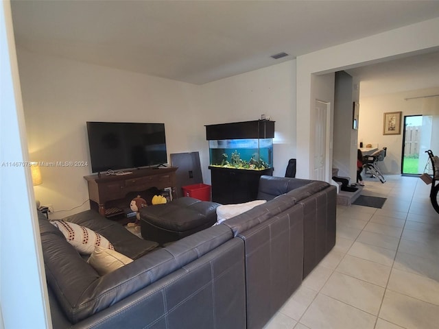 living room featuring light tile patterned flooring