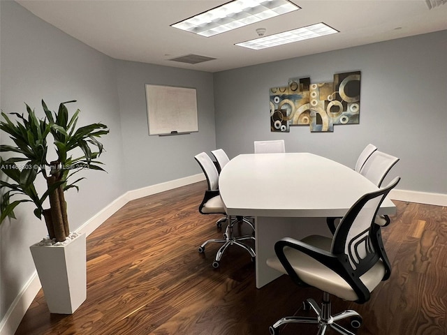 interior space with dark hardwood / wood-style flooring