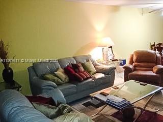 living room featuring carpet floors