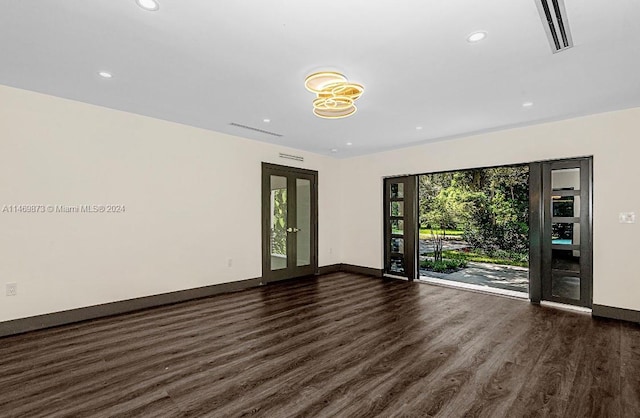 unfurnished room featuring dark wood-type flooring