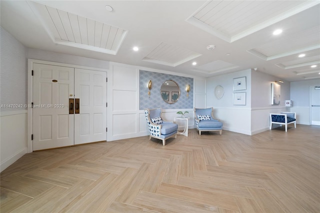 living area featuring light parquet flooring