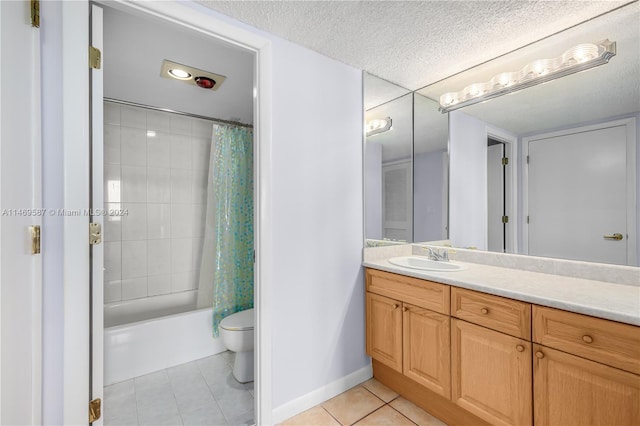 full bathroom with toilet, tile floors, shower / tub combo with curtain, a textured ceiling, and large vanity