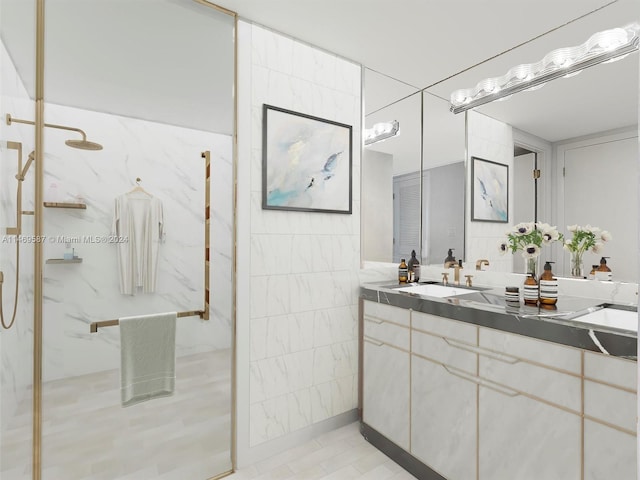 bathroom featuring vanity, tile floors, and tile walls