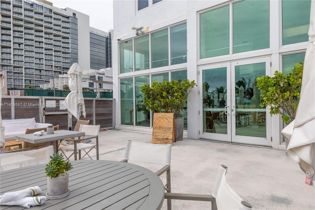 view of terrace featuring french doors