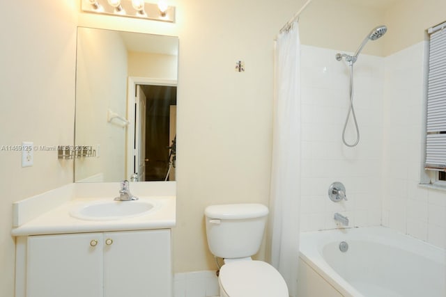 full bathroom featuring vanity, shower / bathtub combination with curtain, and toilet