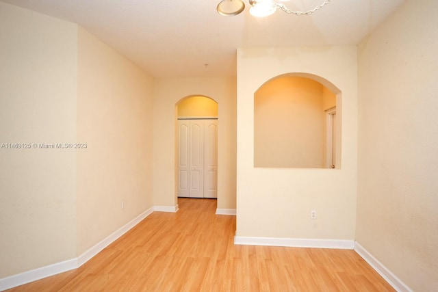 unfurnished room featuring light hardwood / wood-style floors