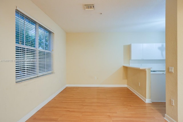 empty room featuring light hardwood / wood-style flooring