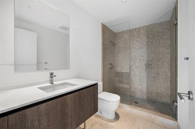 bathroom with vanity, tile floors, a shower with door, and toilet