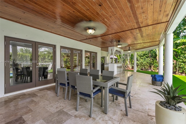 view of patio / terrace with french doors and ceiling fan