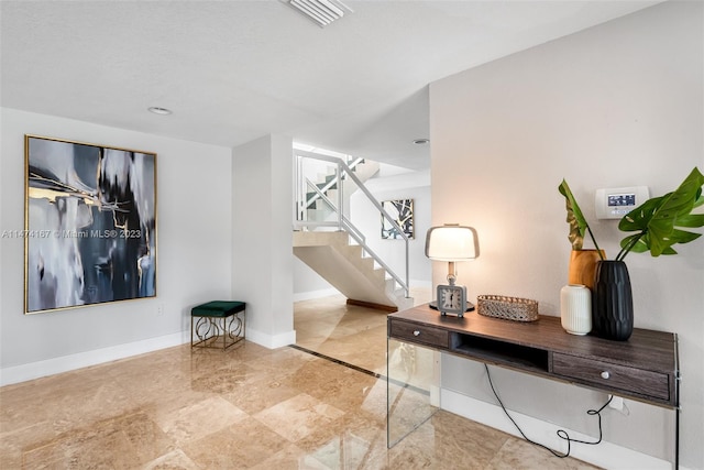 interior space featuring light tile floors