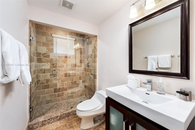 bathroom featuring walk in shower, toilet, vanity, and tile flooring