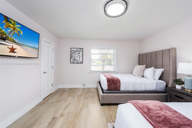 bedroom featuring light hardwood / wood-style floors