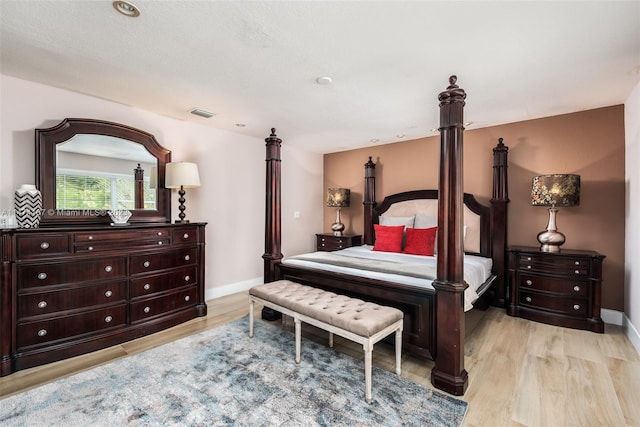 bedroom featuring light wood-type flooring