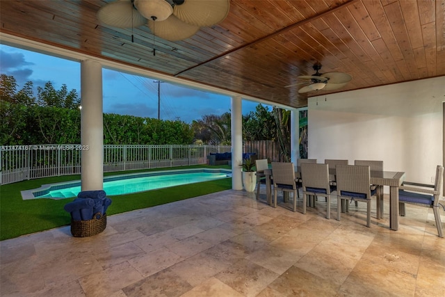 exterior space featuring wooden ceiling and ceiling fan