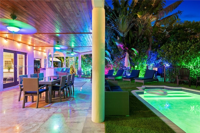 view of patio with an outdoor hangout area and a fenced in pool