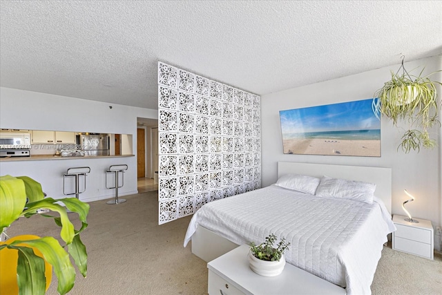 carpeted bedroom featuring stainless steel refrigerator and a textured ceiling