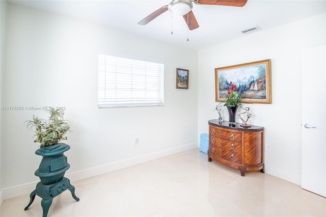 19720 SW 242nd Ter, Homestead, FL 33031 - living area with light tile floors and ceiling fan