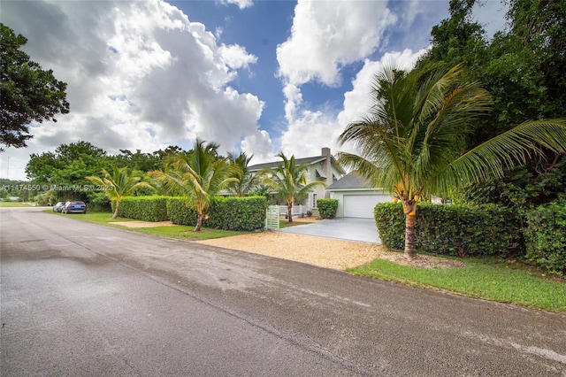 19720 SW 242nd Ter, Homestead, FL 33031 - obstructed view of property featuring a garage