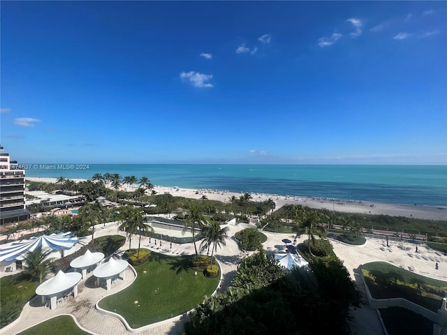 aerial view featuring a water view and a view of the beach