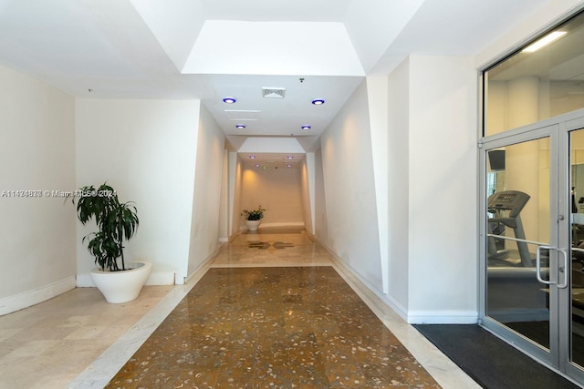 hallway with light tile flooring