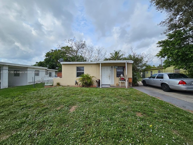 view of front of house with a front yard