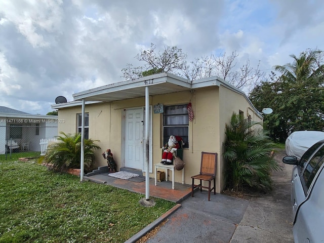 exterior space featuring a yard