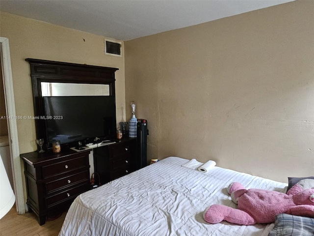 bedroom featuring light wood-type flooring