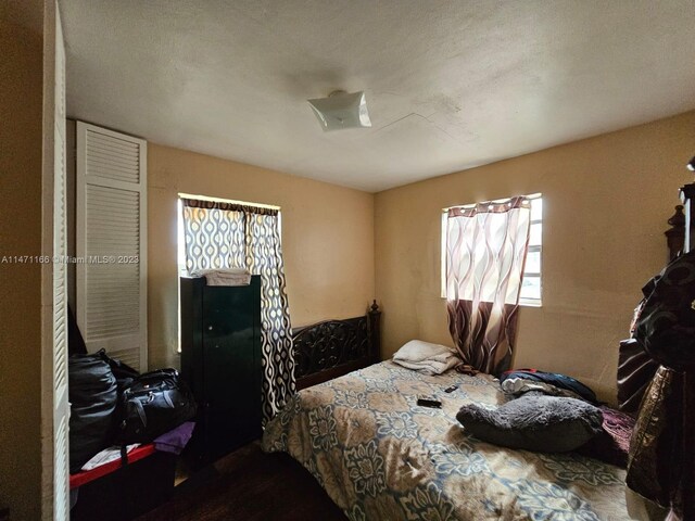 bedroom featuring a textured ceiling