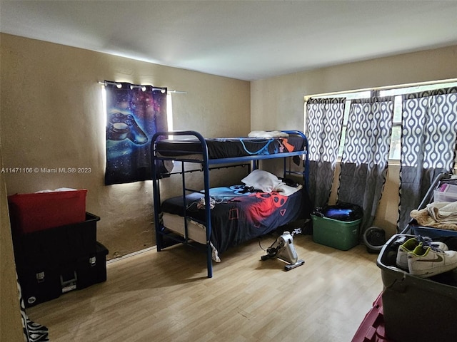 bedroom featuring hardwood / wood-style floors