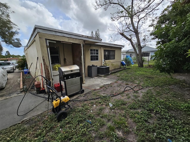 rear view of property with a patio area