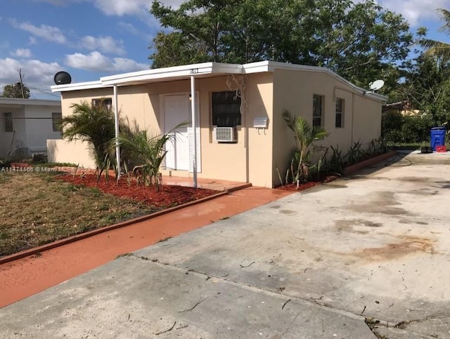 view of front of home with a patio area