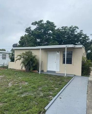 exterior space with a front yard