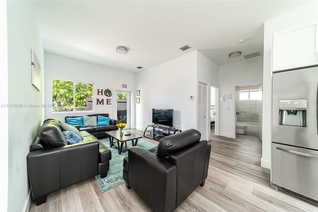 living room with light wood-type flooring