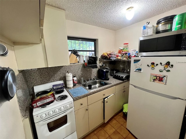 kitchen featuring white appliances, sink, light tile floors, a textured ceiling, and tasteful backsplash