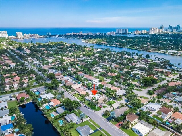 bird's eye view with a water view