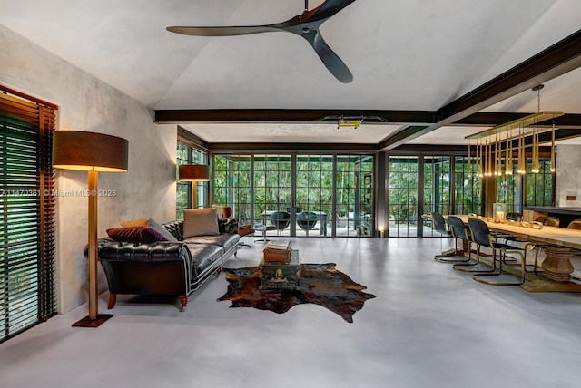 living room featuring concrete floors, ceiling fan, and vaulted ceiling with beams