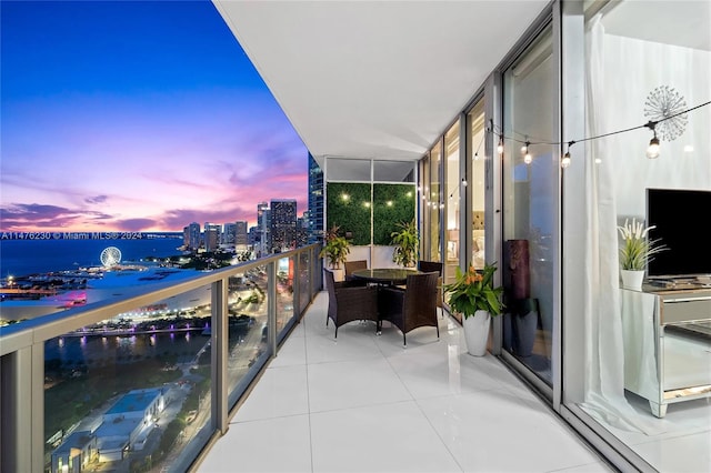 balcony at dusk with a water view