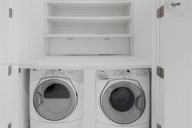 laundry area with independent washer and dryer